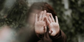 As 37 US states respond to Grok CSAM problem, Apple really needs to act | Conceptual image of child hiding