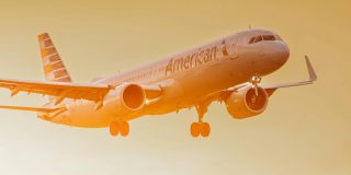 How to use AirTag sharing when travelling with family and friends | American Airlines plane landing at sunset