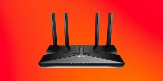 Most popular home internet routers in US may be banned as national security risk | TP-Link wireless router on a red background