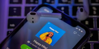 Spotify had its first ever profitable year; may have been assisted by Apple | App seen on an iPhone