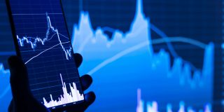 AAPL Q3 2025 Analyst expectations | Stock image of graphs on small and large screens