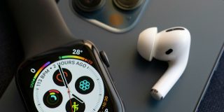 Apple Watch and AirPods (shown in close-up photo) continue to dominate the global market