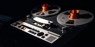 Neon app to sell your audio calls says it will return after massive security breach | Reel-to-reel tape recorder shown