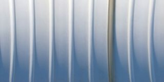 Apple shared 'bendgate' lessons as it helped small US manufacturers innovate | Abstract image of bent lines