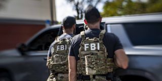 Reddit comment led police to identify Brown University shooter | Stock image of FBI SWAT team members