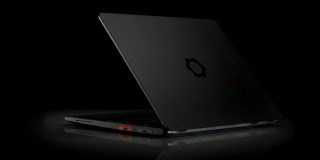 Framework Laptop 13 Pro seen in a low-key photo