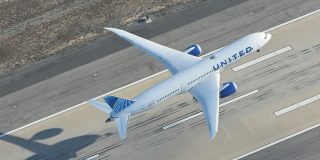 United Airlines app streamlines AirTag tracking, tells you TSA wait times | Photo shows a 787-9 leaving the runway on a flight to London