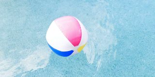 Beachballs or lagging Mac? AI photo scanning may be the reason | Photo shows a beach ball in a swimming pool