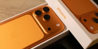 There's a devious new free phone scam, to add to the lengthy list | Photo shows the unboxing of an iPhone 17 Pro in Cosmic Orange
