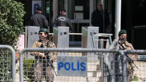 Reuters Two Turkish Police's special forces stand guard holding rifles