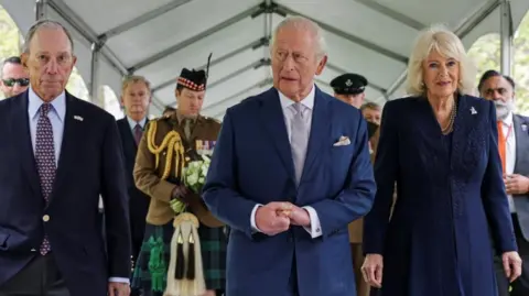 Reuters Britain's King Charles and Queen Camilla arrive to visit the 9/11 Memorial as part of their state visit to the United States, in New York City