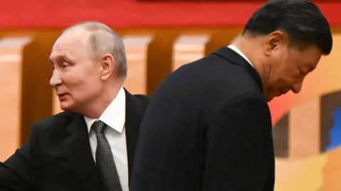 Getty China's President Xi Jinping (R) and Russia's President Vladimir Putin attend the opening ceremony of the third Belt and Road Forum for International Cooperation at the Great Hall of the People in Beijing on October 18, 2023