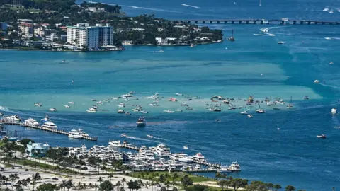 AFP via Getty Images Drone birds-eye shot of the Haulover Sandbar in Miami, Florida.