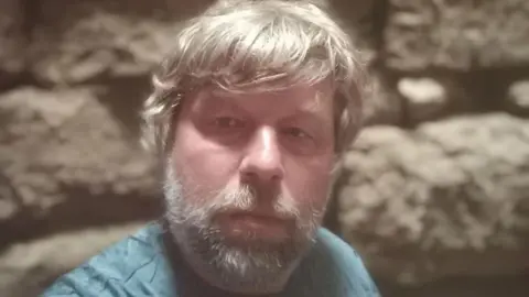 t.me/kotovayanora Alexander Butyagin takes a selfie at an ancient site in Ukraine's Crimea peninsula. File photo