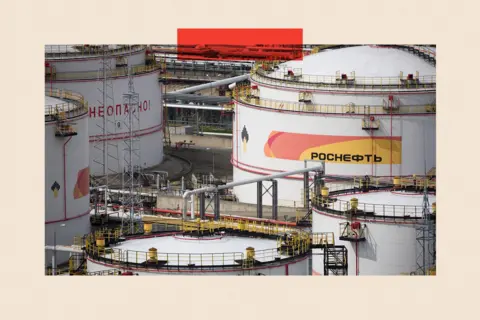 Bloomberg via Getty Images Oil storage tanks
