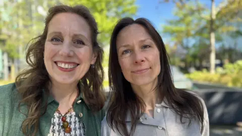 Local politicians Anneke Veenhoff (left) and Anke Bakker smile at the camera