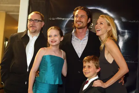 Getty Images The Ring actors Brian Cox, Daveigh Chase, Martin Henderson, David Dorfman and Naomi Watts pose together at the premiere of the film in Los Angeles in 2002. 