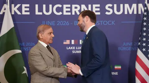 Getty Images Vice-President JD Vance shakes hands with Pakistan's Prime Minister Shehbaz Sharif