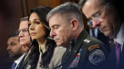 Getty Images Federal Bureau of Investigation Director Kash Patel, Director of the Defense Intelligence Agency (DIA) Lt. Gen. James Adams III, Director of National Intelligence Tulsi Gabbard, Army Lt. Gen. William Hartman and Central Intelligence Agency Director John Ratcliffe testify