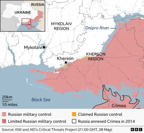 Map of southern Ukraine showing the front line around Kherson and Mykolaiv. Areas shaded in red indicate Russian military control, covering much of the territory east of the Dnipro River and extending south into Crimea, which is outlined as annexed by Russia in 2014. A narrow, hatched strip near the river and coastline marks areas of limited Russian. .