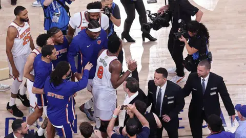 Getty Images OG Anunoby #8 of the New York Knicks celebrates with teammates after their 107-106 victory against the San Antonio Spurs in Game Four of the 2026 NBA Finals at Madison Square Garden.