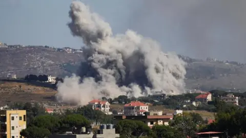 Reuters Israeli strike seen from Nabatieh 19 June