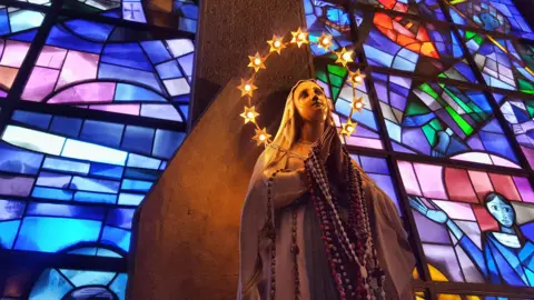 Getty Images A statue of the Virgin Mary