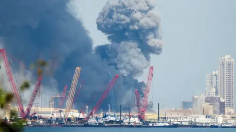 Reuters Smoke above US base. 