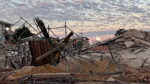Getty Images The collapse of the building in George trapped 81 people