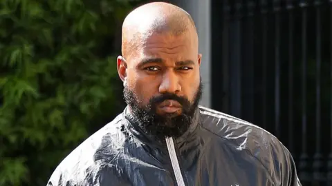 Getty Images Kanye West is seen outdoors on March 21, 2024 in Los Angeles, California, wearing a black jacket