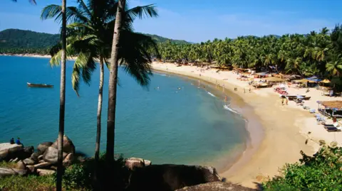 Getty Images South Goa with hills and palm trees on a bright sunny day. Shot taken near Palolem beach. 