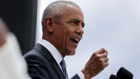 Getty Images Former US President Barack Obama speaks during the dedication ceremony for the opening of the Barack Obama Presidential Center in John Lewis Plaza on 18 June 2026 in Chicago, Illinois. 