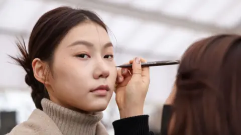 Getty Images A model is seen during the prerecording of Miss Gee Collection runway show as a part of Seoul Fashion Week 2022 in Seoul, South Korea. 