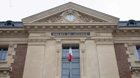 AFP via Getty Images Facade of Versailles court house