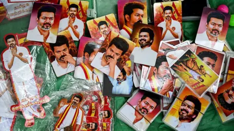 AFP via Getty Images A vendor sells pictures of Indian actor and Tamilaga Vettri Kazhagam (TVK) party president C Joseph Vijay during vote counting for the Tamil Nadu Legislative Assembly elections, at the party headquarters in Chennai on May 4, 2026