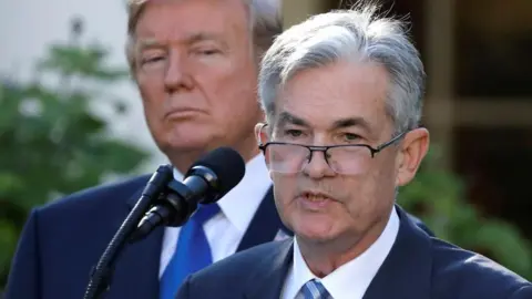 Reuters Donald Trump looks on as Jerome Powell speaks at the White House in November 2017
