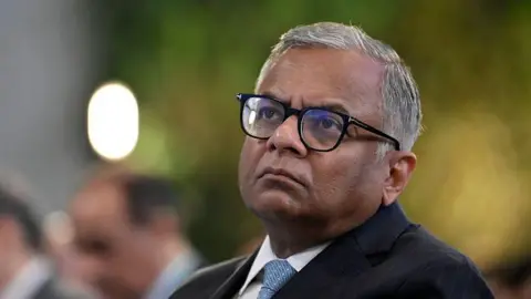 Getty Images Natarajan Chandrasekaran, Chairperson of Tata Sons in a suit, at the listing ceremony of Tata Capital Limited in Mumbai, India, on October 13, 2025. 