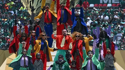 Getty Images Colombian singer and producer J Balvin performs during the opening ceremony