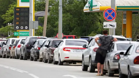 Reuters Cars queue for fuel at a gas station after the authorities restricted fuel sales amid a supply shortage following Ukrainian attacks on logistics routes in the course of Russia-Ukraine conflict, in Saki, Crimea June 1, 2026