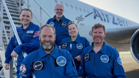 John Kennett John Kennett with the team on the ground with the parabolic flight test plane