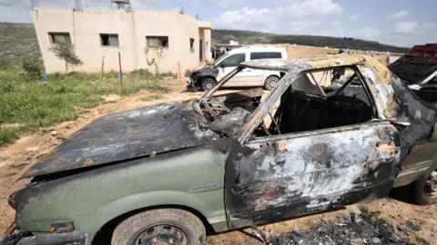 EPA File photo showing a burned-out car following what Palestinians said was an attack by Israeli settlers in the Wadi al-Lubban al-Shamali area, south of Nablus, in the occupied West Bank (6 April 2026)