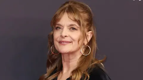 Getty Images Nastassja Kinski in a black dress in 2023