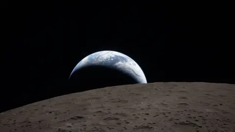 NASA The blue Earth rising above the brownish grey surface