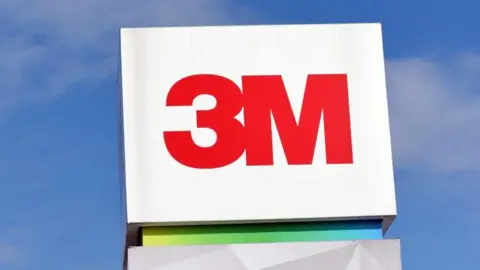 Reuters The letters 3M in red on a white box against the blue sky