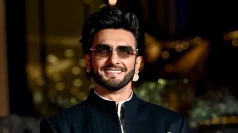 AFP via Getty Images Bollywood actor Ranveer Singh attends the celebrations for the third anniversary of the Nita Mukesh Ambani Cultural Centre in Mumbai on April 3, 2026. 