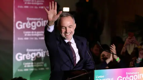 Getty Images Paris mayoral candidate Emmanuel Grégoire celebrates with supporters after exit polls say he has won the mayoral runoff election on March 22, 2026 in Paris, France. After last week's first-round vote, the frontrunners were Socialist Party candidate Emmanuel Grégoire and his conservative challenger Rachida Dati. The current mayor, Anne Hidalgo, did not seek a third six-year term.
