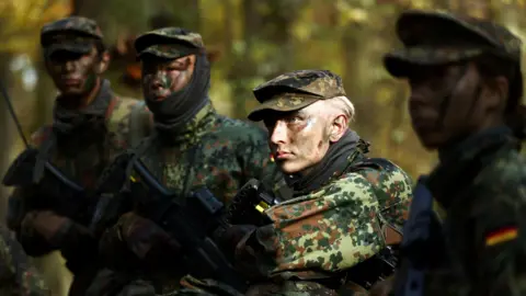 Reuters Four German soldiers