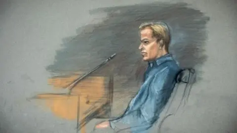 Reuters A court illustration shows a man in a blue shirt sitting at a desk