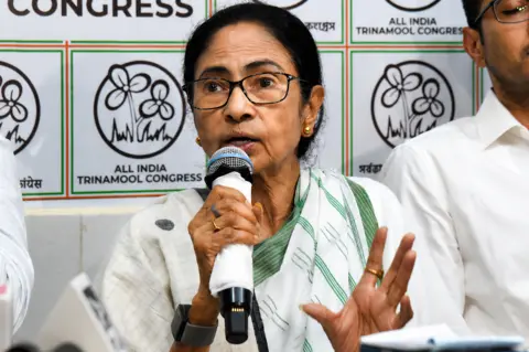 NurPhoto via Getty Images Chief Minister of West Bengal and Chairperson of the All India Trinamool Congress, Mamata Banerjee, addresses a press conference at her residence office in Kolkata, India, on May 5, 2026, after her party lost the recently concluded state legislative assembly elections.