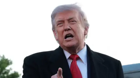 Reuters US President Donald Trump speaks to reporters Lincoln Memorial Reflecting Pool in Washington DC.